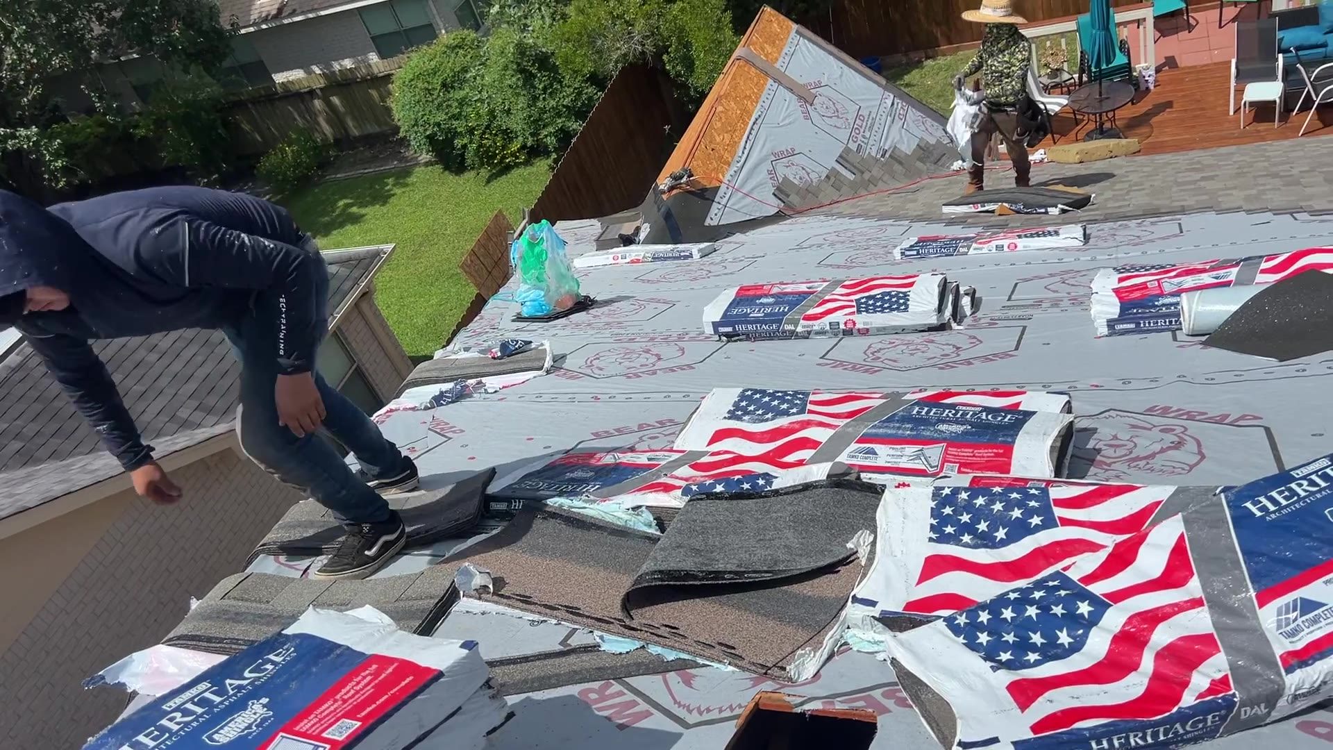 Stanley Restoration crew installing architectural shingles