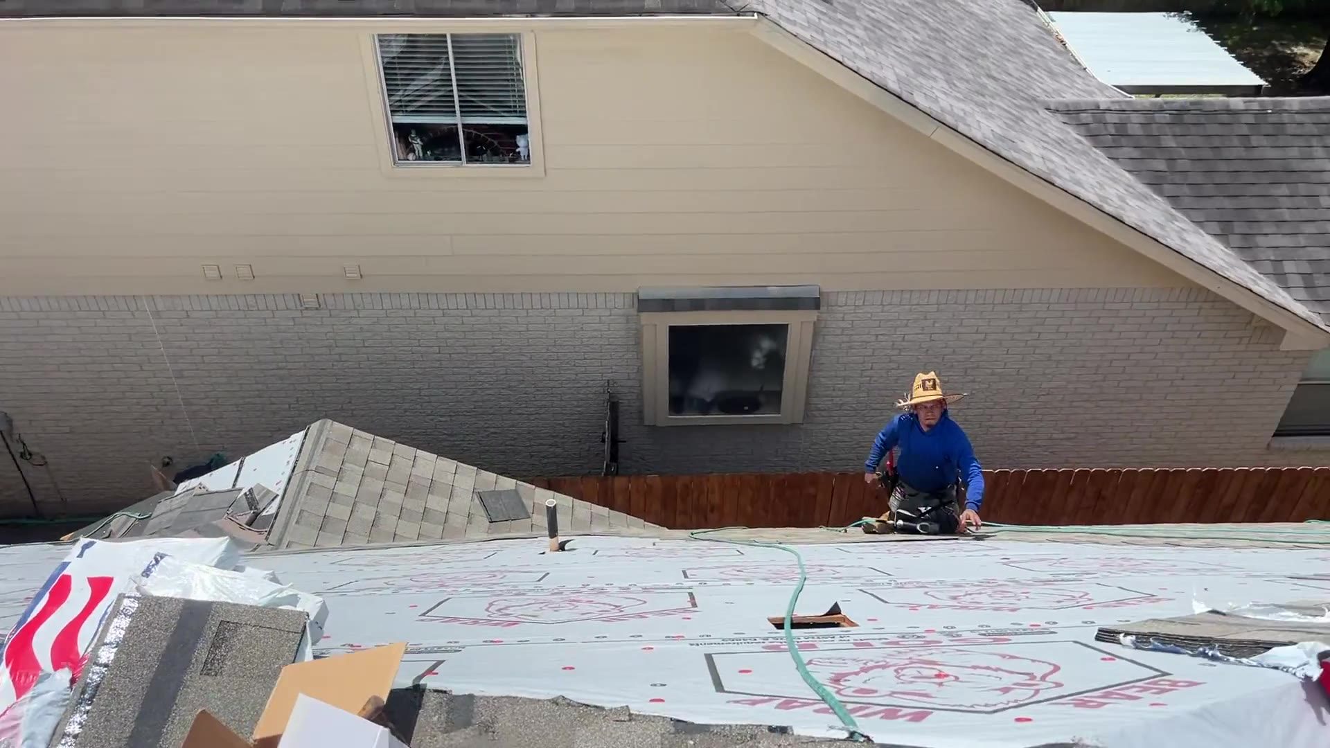 Stanley Restoration crew on a Houston roof during a replacement